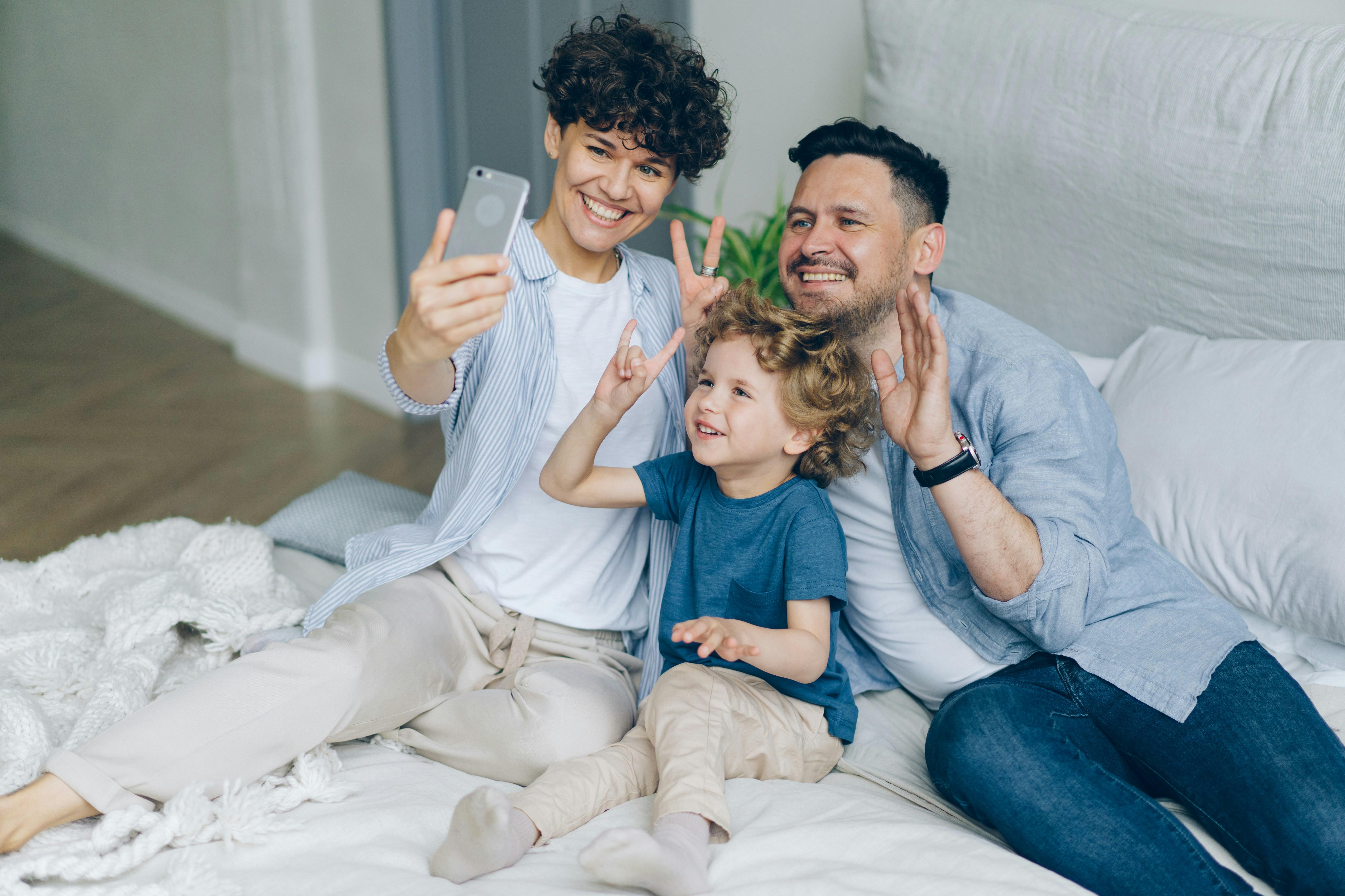 Family taking a selfie together at home
